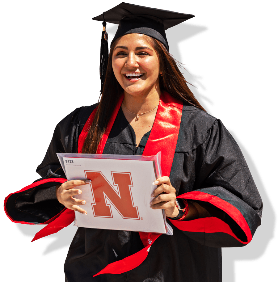 Graduate holding diploma