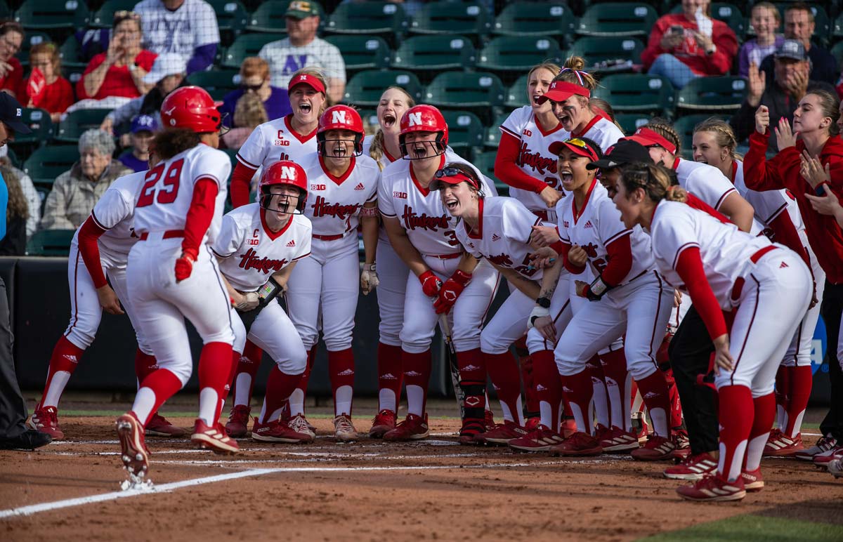 softball team celebrating