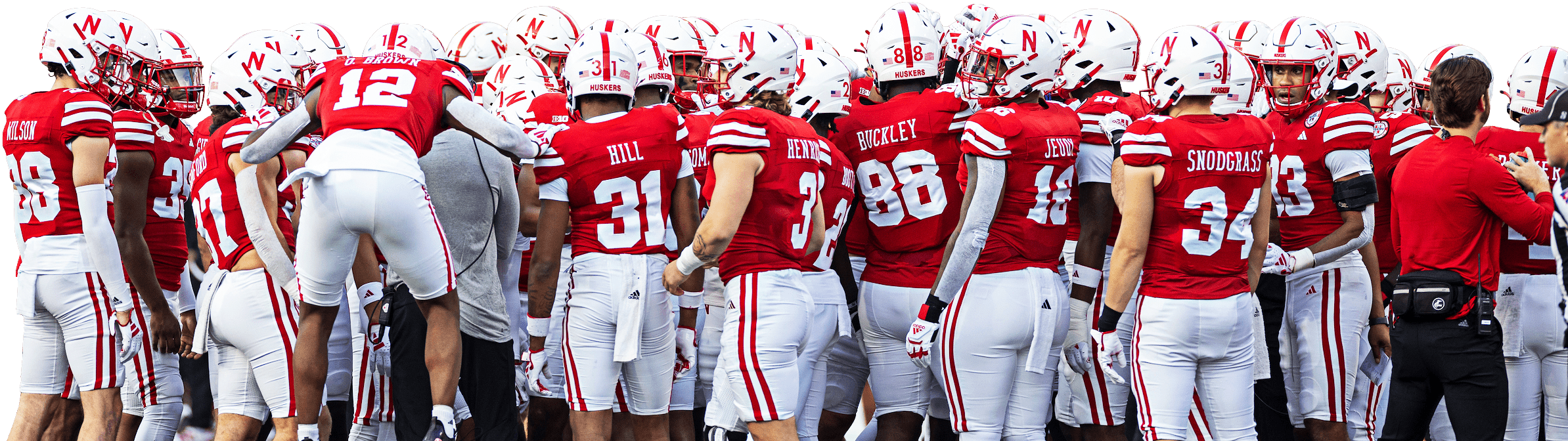 football team in a huddle