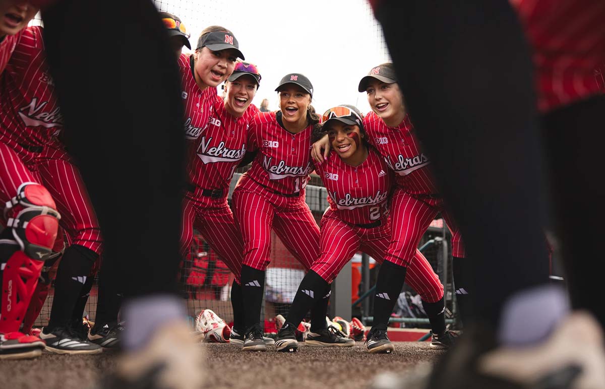 softball team celebrating