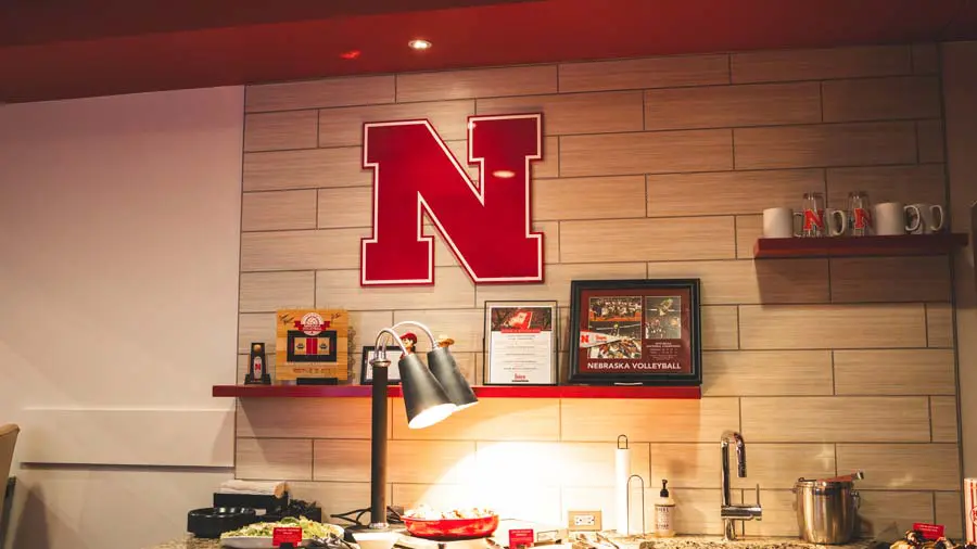 Empty chairs with fridge in the back